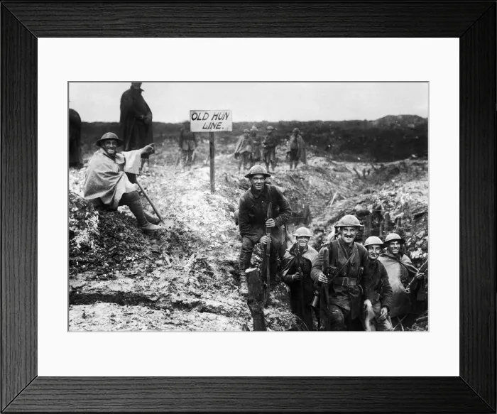 Framed Print : Old Hun Line - British soldiers take over a captured German trench during World War One Framed Print : Old Hun Line - British soldiers take over a captured German trench during World War One