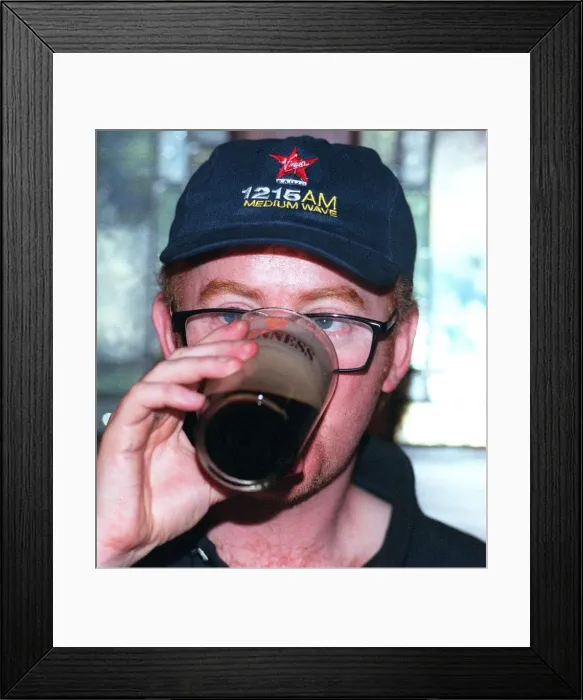 Framed Print : Chris Evans drinks a pint of Guinness in O Neill Framed Print : Chris Evans drinks a pint of Guinness in O Neill