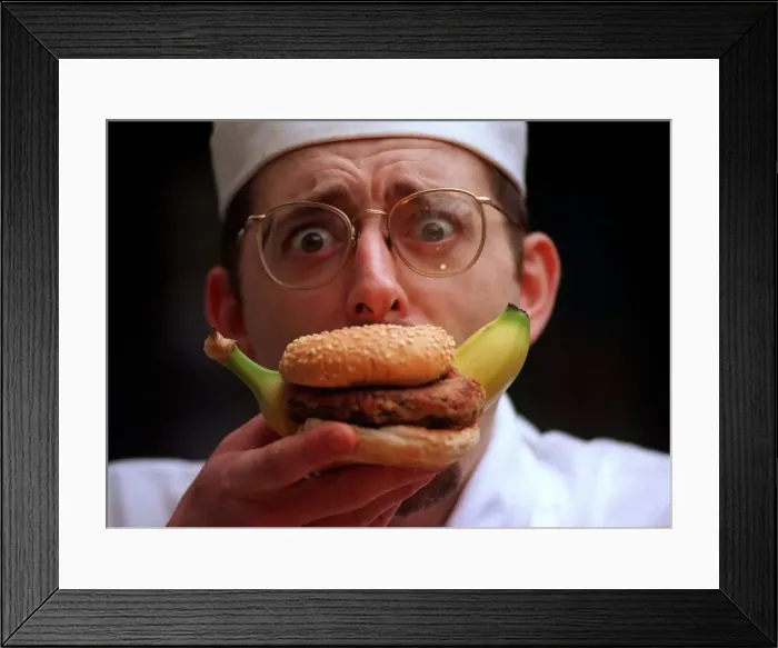 Framed Print : John Quigley chef eating a banana burger Framed Print : John Quigley chef eating a banana burger