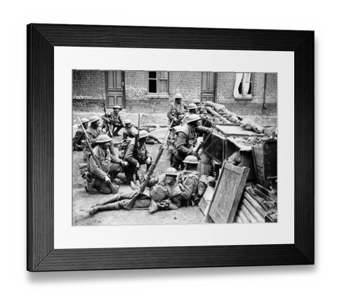 Framed Print : British soldiers take cover behind a barricade in Bailleul in anticipation Framed Print : British soldiers take cover behind a barricade in Bailleul in anticipation
