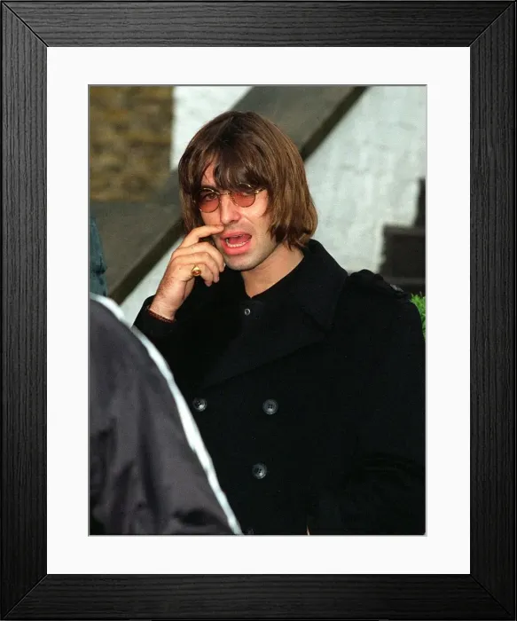 Framed Print : Liam Gallagher lead singer with the pop group Oasis leaves his St Johns Wood home for Framed Print : Liam Gallagher lead singer with the pop group Oasis leaves his St Johns Wood home for