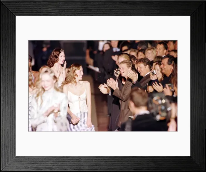 Framed Print : Paul McCartney and wife Linda applaud their daughter Stella McCartney after her first