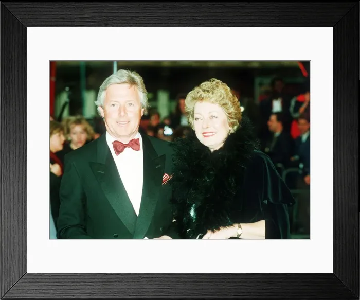 Framed Print : Michael Aspel TV Presenter with wife at the premiere of Where Angels Fear To Tread Framed Print : Michael Aspel TV Presenter with wife at the premiere of Where Angels Fear To Tread