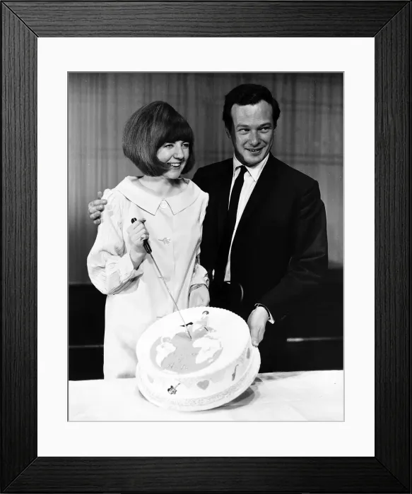Framed Print : Cilla Black Singer / TV Presenter cutting cake with Brian Epstein in 1964 Framed Print : Cilla Black Singer / TV Presenter cutting cake with Brian Epstein in 1964