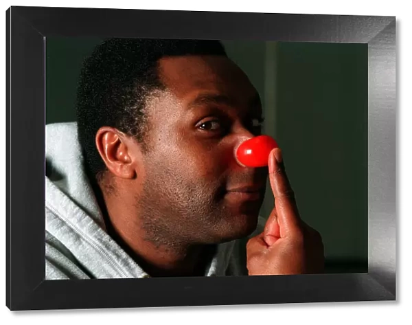 Lenny Henry Comedian December 1997 Wearing red nose for Red Nose Day