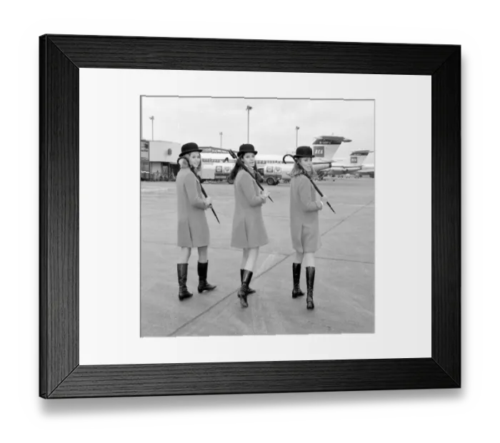Framed Print : Models at Heathrow Burberry models of to Stockholm Fashion Show as part of Framed Print : Models at Heathrow Burberry models of to Stockholm Fashion Show as part of