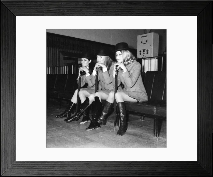Framed Print : Models at Heathrow Burberry models of to Stockholm Fashion Show as part of