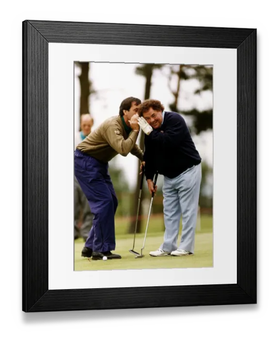 Framed Print : Eddie Little Comedian listens as Sevvy Ballesteros Golf whispers in his ear at a Pro Framed Print : Eddie Little Comedian listens as Sevvy Ballesteros Golf whispers in his ear at a Pro