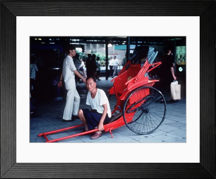 Framed Print : Push-Push men awaiting customers at Central Station in Hong Kong circa 1980 Framed Print : Push-Push men awaiting customers at Central Station in Hong Kong circa 1980