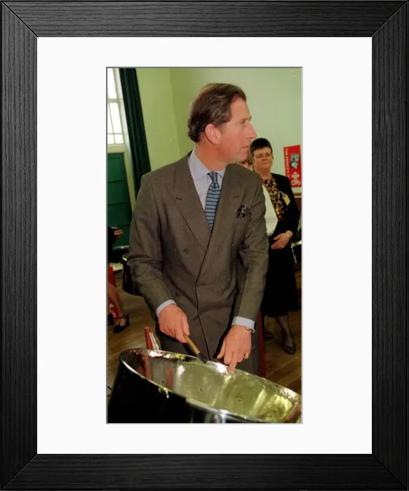 Framed Print : Prince Charles on a school visit in Norwich, March 1998 Playing steel drum Framed Print : Prince Charles on a school visit in Norwich, March 1998 Playing steel drum
