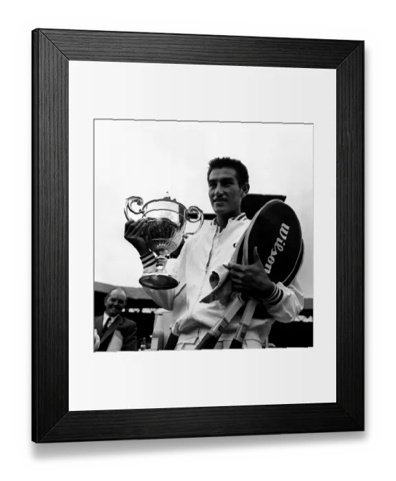 Framed Print : Alex Olmedo wins the mens singles final at Wimbledon 1959 against Rod Laver holding up Framed Print : Alex Olmedo wins the mens singles final at Wimbledon 1959 against Rod Laver holding up