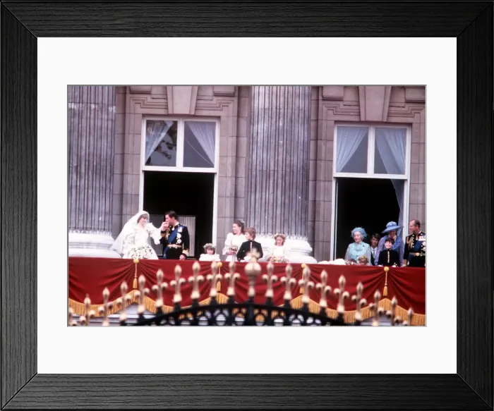 Framed Print : Prince Charles kisses Dianas hand at Buckingham Palace following their wedding Framed Print : Prince Charles kisses Dianas hand at Buckingham Palace following their wedding