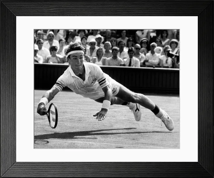 Framed Print : Pat Cash dives for the ball during the match against Mats Wilander