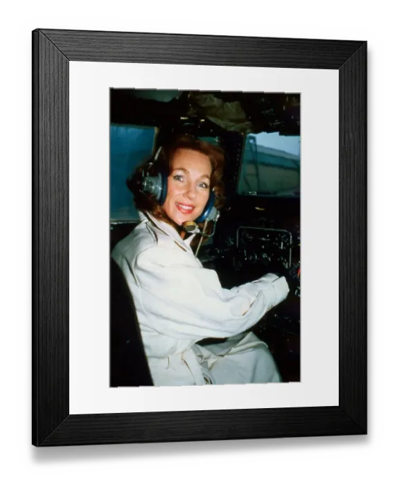 Framed Print : English actress Shirley Anne Field in the cockpit of a helicopter. June 1980