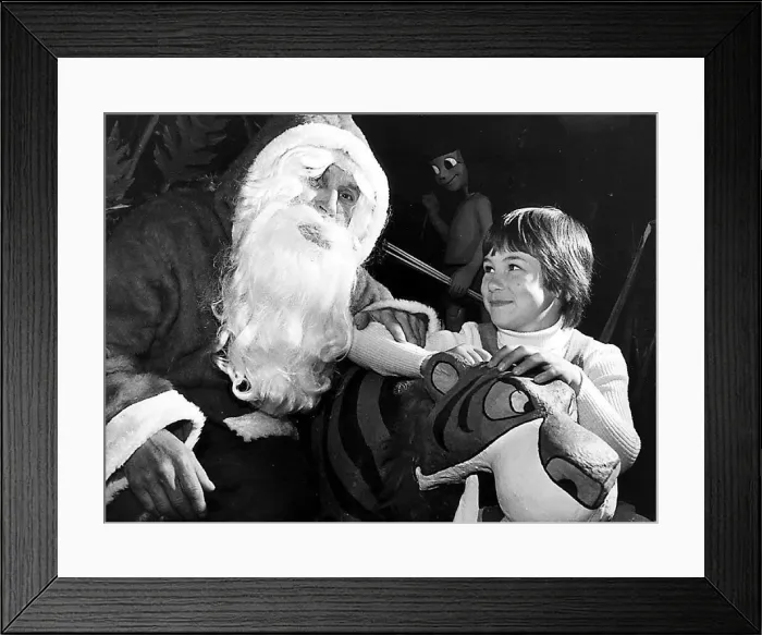  : Binns Santa Claus Arthur Smith with eight year old Joanne Cole, of Woburn Avenue