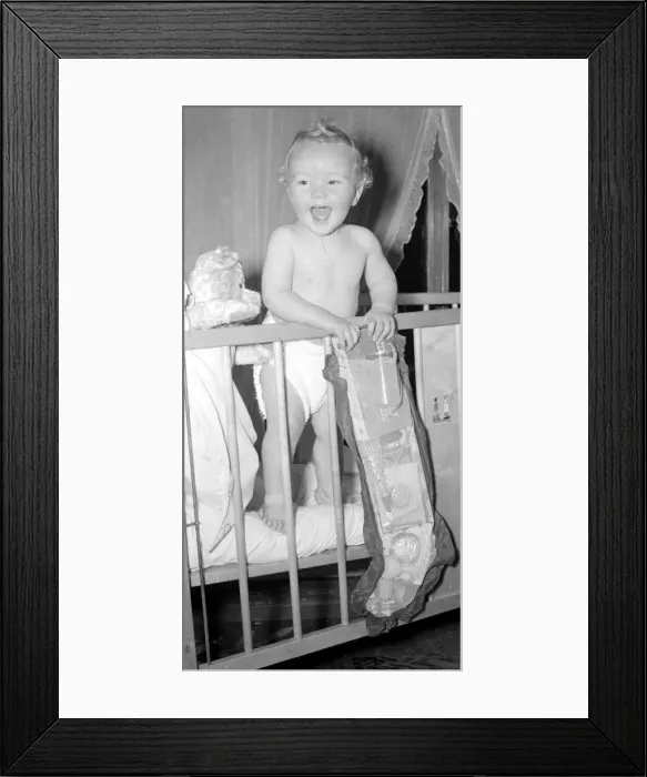 Framed Print : Baby Stephen Reynolds with his Christmas Stocking December 1954 Neg No E9179 Framed Print : Baby Stephen Reynolds with his Christmas Stocking December 1954 Neg No E9179