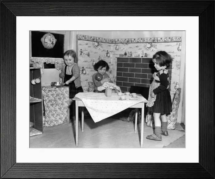 Framed Print : These girls are starting to learn how to be housewives early at this Newcastle nursery in Framed Print : These girls are starting to learn how to be housewives early at this Newcastle nursery in