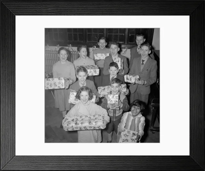 Framed Print : Children at the St Agnes Home for Children with their Christmas presents December