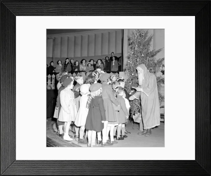 Framed Print : A Teddy Boy dressed as Father Christmas hands out presents at the Christians Rendezous Framed Print : A Teddy Boy dressed as Father Christmas hands out presents at the Christians Rendezous