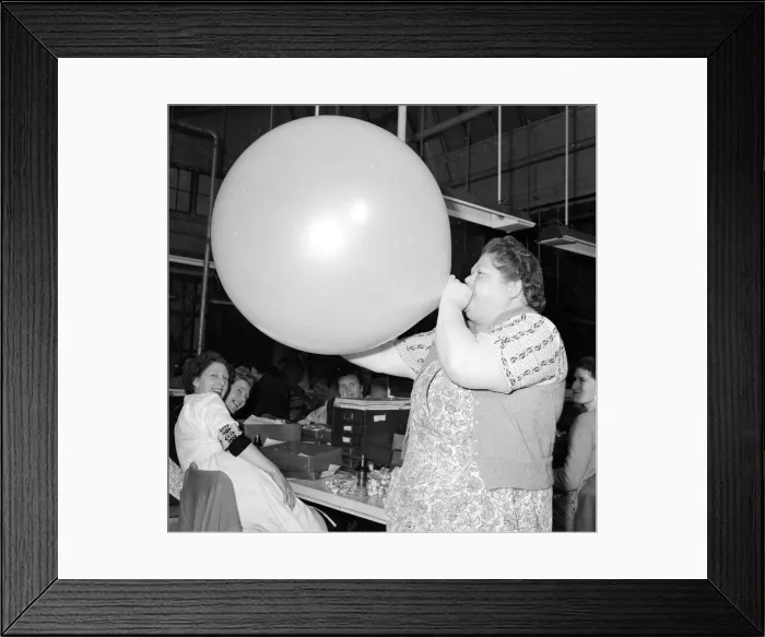 Framed Print : Louise German carries out quality control on Ariel Christmas Balloons Neg No D7130 Framed Print : Louise German carries out quality control on Ariel Christmas Balloons Neg No D7130