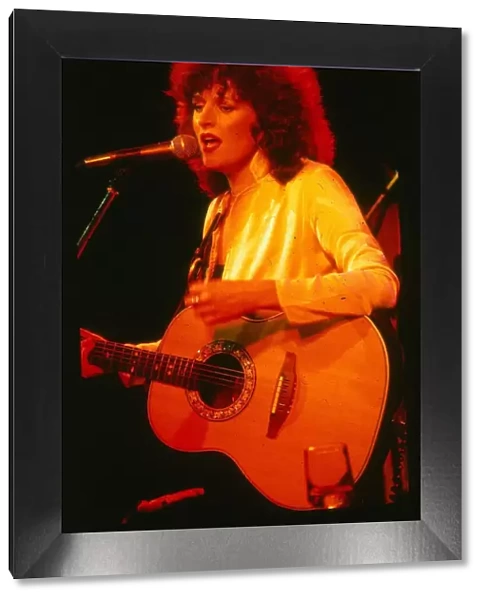 Barbara Dickson singer actress December 1978 on stage singing playing guitar