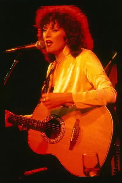 Barbara Dickson singer actress December 1978 on stage singing playing guitar
