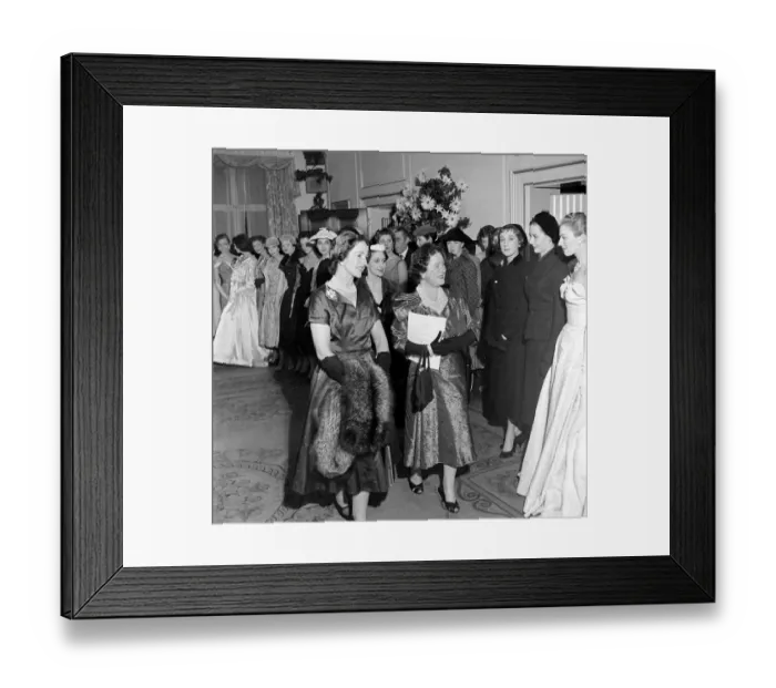 Framed Print : The Queen Mother and Princess Margaret seen here at the Salon of clothes designer Hardy