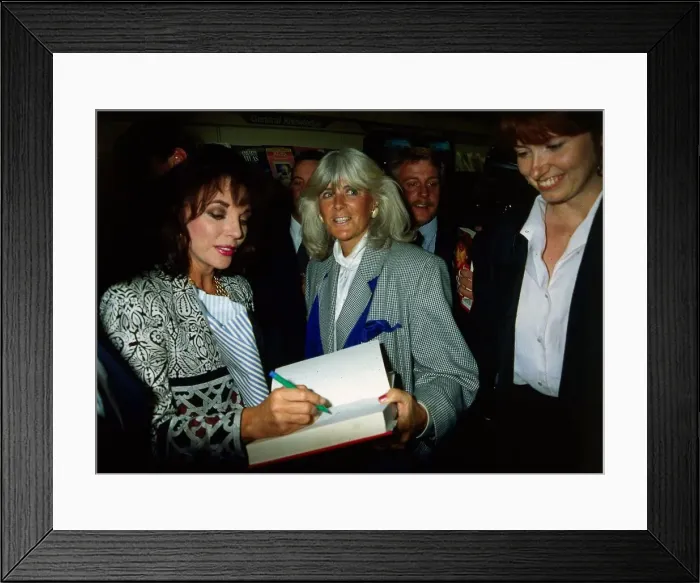 Framed Print : Joan Collins signing book for Nancy Smith June 1989 Framed Print : Joan Collins signing book for Nancy Smith June 1989