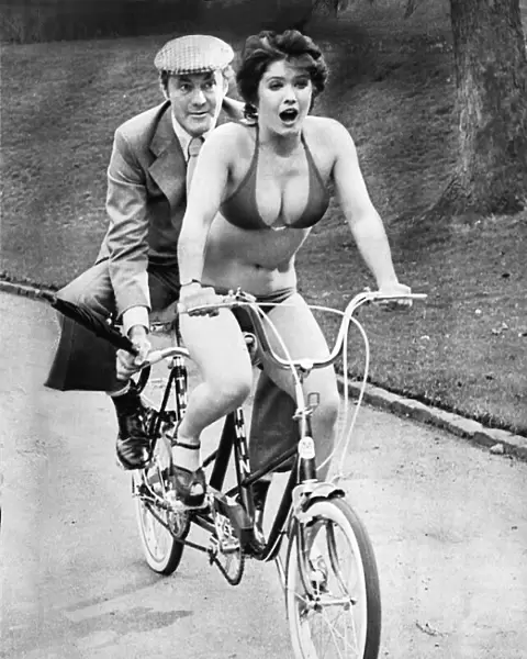 Actress (and former Doctor Who companion) Deborah Watling on a bike in Aberdeen with co