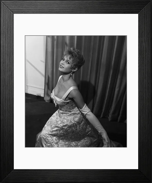 Framed Print : French actress Bridgitte Bardot rehearses her curtsy in anticipation of her meeting with Framed Print : French actress Bridgitte Bardot rehearses her curtsy in anticipation of her meeting with
