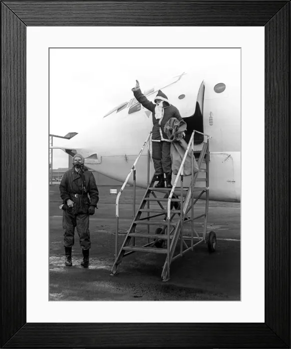 Framed Print : The arrival of Santa Claus by V-bomber at Gaydon RAF station in 1964 Framed Print : The arrival of Santa Claus by V-bomber at Gaydon RAF station in 1964