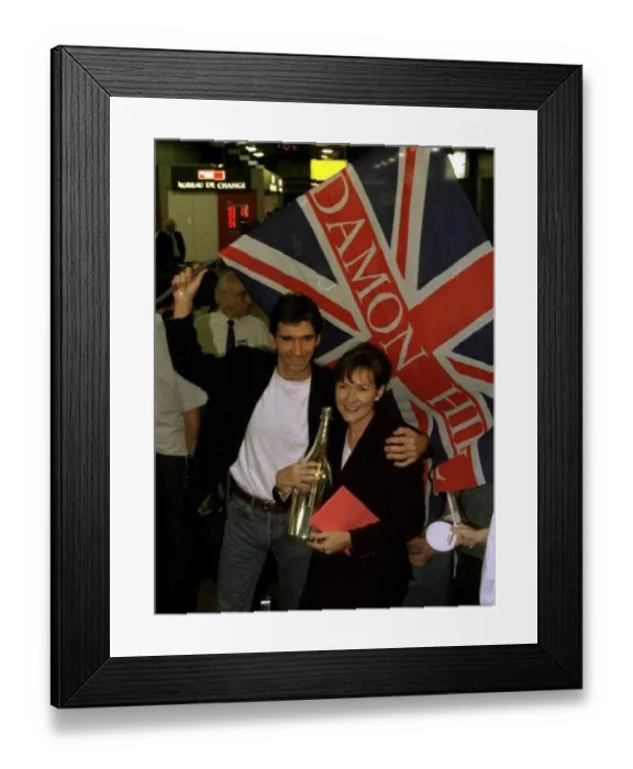 : Damon Hill Arrives At Heathrow With His Wife Georgie After His Winning The Formula One : Damon Hill Arrives At Heathrow With His Wife Georgie After His Winning The Formula One