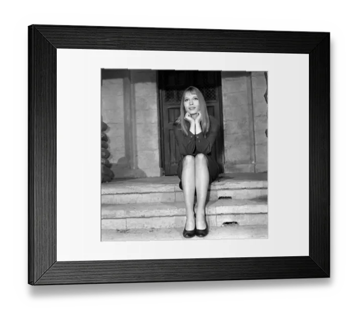 Framed Print : Mia Farrow actress in London April 1964 sitting on steps in front of doorway