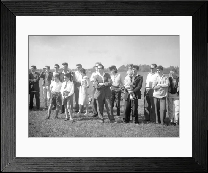 Framed Print : Enthusiasts gather at the edge of the pitch waiting for the game of Motoball Framed Print : Enthusiasts gather at the edge of the pitch waiting for the game of Motoball
