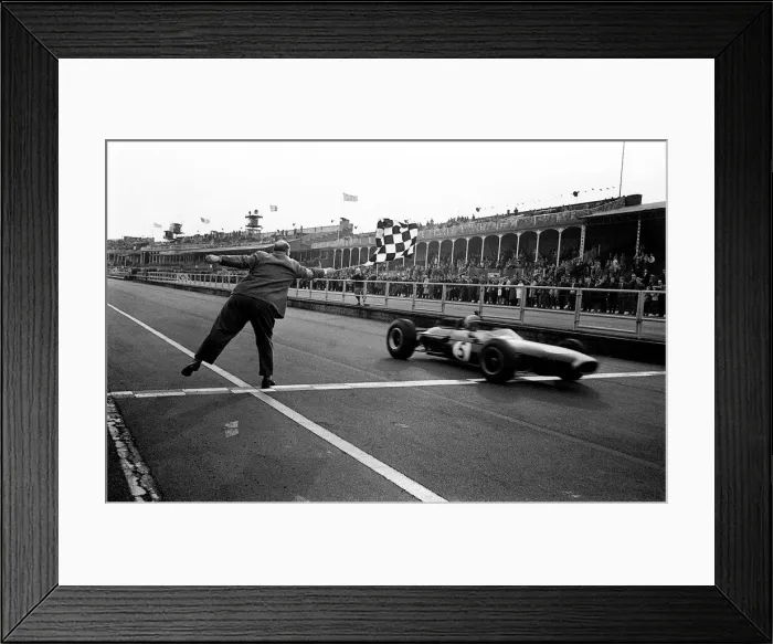 Framed Print : Jack Brabham gets the Chequered flag at the end of the Aintree International 200 Framed Print : Jack Brabham gets the Chequered flag at the end of the Aintree International 200