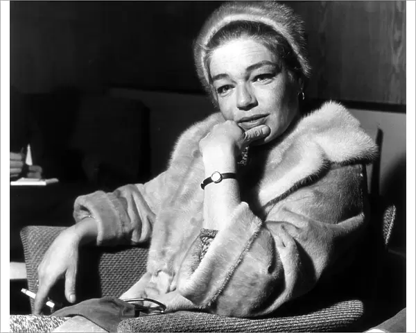 Simone Signoret Actress wearing fur coat and hat A©Mirrorpix