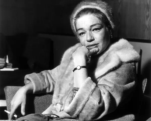 Simone Signoret Actress wearing fur coat and hat A©Mirrorpix