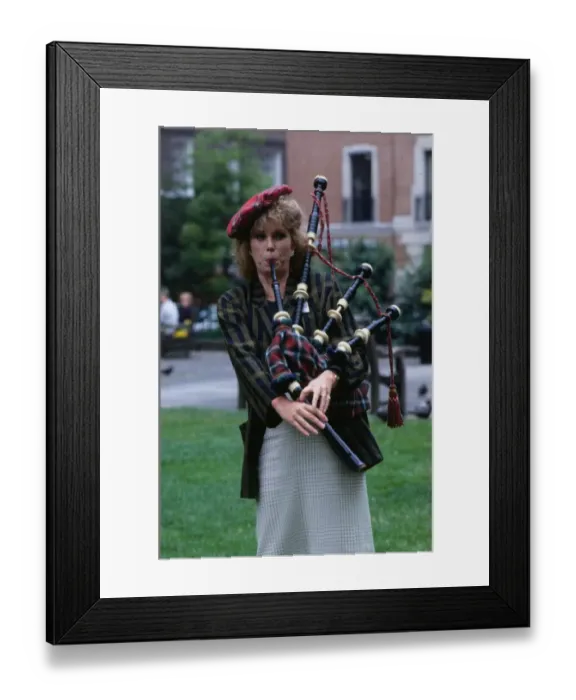 Framed Print : Joanna Lumley actress June 1989 trying to play bagpipes Framed Print : Joanna Lumley actress June 1989 trying to play bagpipes