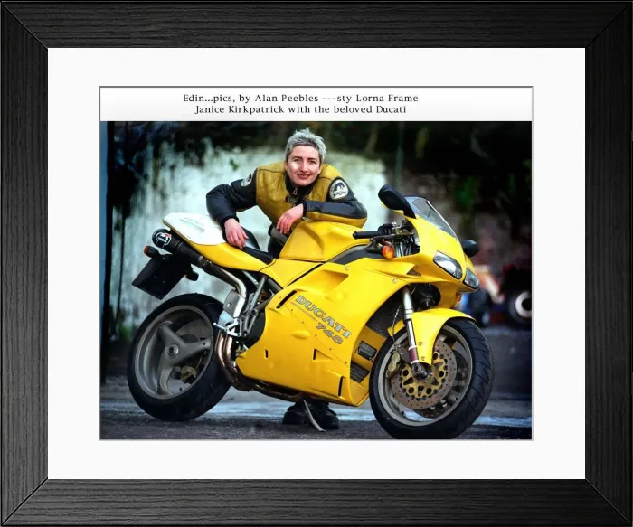 Framed Print : Janice Kirkpatrick top designer with her yellow Ducati 748 motorcycle Framed Print : Janice Kirkpatrick top designer with her yellow Ducati 748 motorcycle