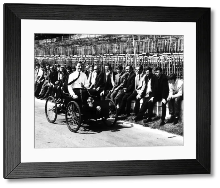 Framed Print : Graham Hill racing driver driving a replica of first Ford car Quadricycle made by