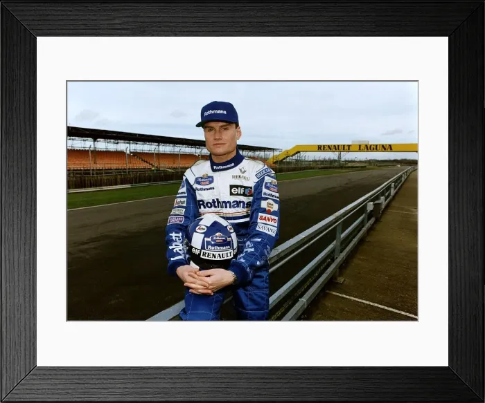 Framed Print : David Coulthard sitting on fence at race track holding helmet Formula One racing Framed Print : David Coulthard sitting on fence at race track holding helmet Formula One racing