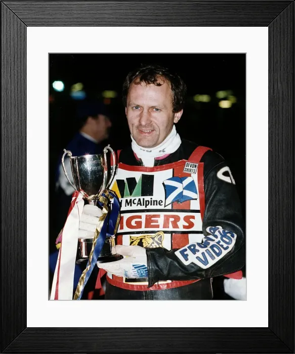 Framed Print : Nigel Crabtree stands holding the Phonesport KO Cup motorcycling speedway outdoors night