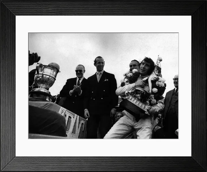 Framed Print : Jackie Stewart after winning British Grand Prix holding trophy Framed Print : Jackie Stewart after winning British Grand Prix holding trophy
