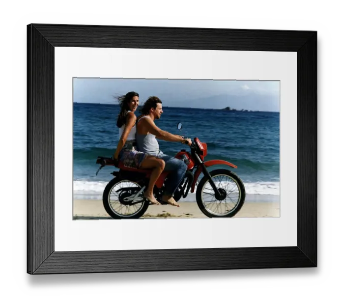 Framed Print : Lynn Wales with Andreas taverna owner on back of motorbike on beach Mykonos Framed Print : Lynn Wales with Andreas taverna owner on back of motorbike on beach Mykonos