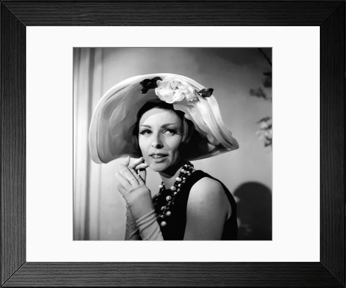 Framed Print : Taken from a series of shots depicting the latest in millinery trends in Spring 1962
