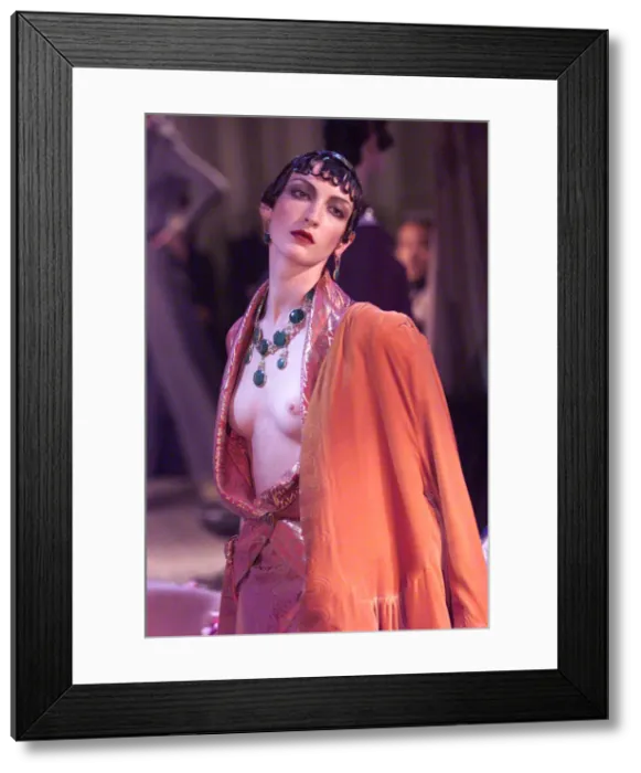 Framed Print : A model wearing a John Galliano Spring / Summer 1999 design for Paris Fashion Week Framed Print : A model wearing a John Galliano Spring / Summer 1999 design for Paris Fashion Week