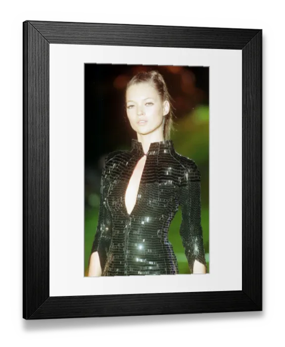 Framed Print : Kate Moss Supermodel models Versace design January 1999 at the Versace show during