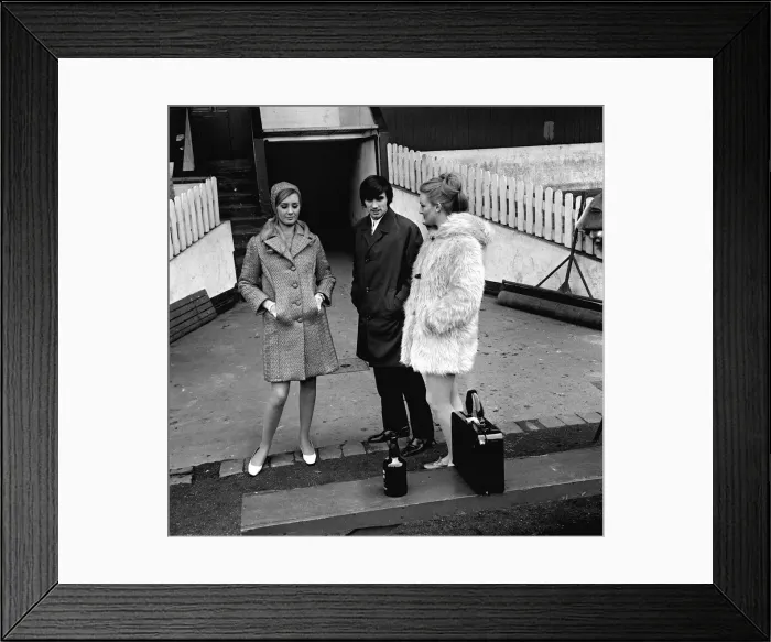 Framed Print : George Best of Manchester United with two models 1964 at Old Trafford for fashion