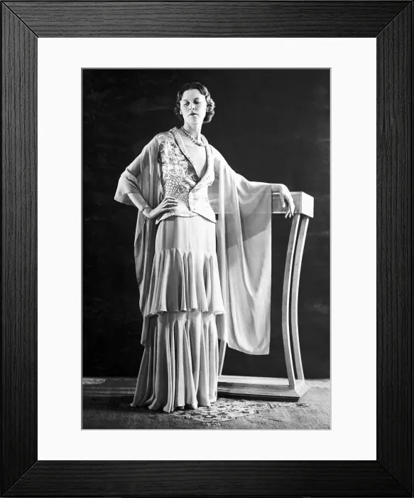 Framed Print : Fashion in the 1930 s: this model is wearing an evening ensemble of opaline green