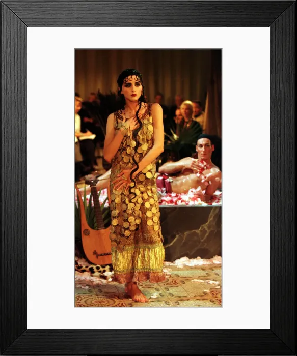 Framed Print : John Galliano fashion show Paris October 1998 Model wearing a patterned Egyptian Framed Print : John Galliano fashion show Paris October 1998 Model wearing a patterned Egyptian
